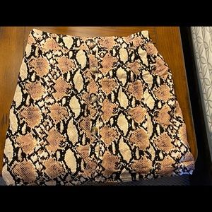 Trendy pink snakeskin skirt
